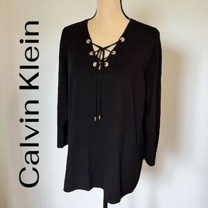 Calvin Klein-Women’s rayon sweater. Black. Tie neckline w/gold CK grommets. EUC!